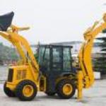 Backhoe loaders used to remove snow from roads